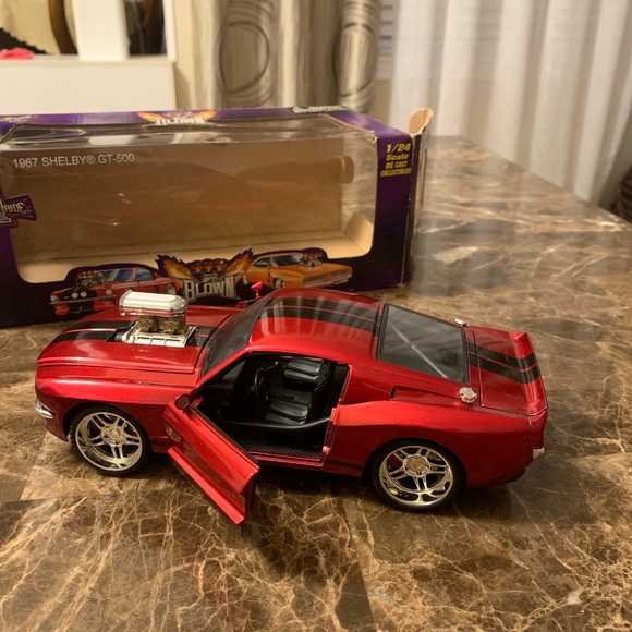 Badd Ride DieCast Collectibles
1967 SHELBY GT 500 1:24 Scale
Vintage - Picture 10 of 10